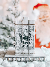 Load image into Gallery viewer, Stamped Book Stack - Vertical Vintage Santa Postcard