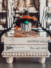 Load image into Gallery viewer, Stamped Book Stack - something wicked this way comes with witch hat and broom
